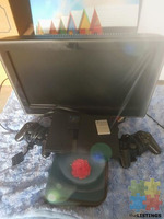 PS2/accessories + Case of games/demos + tv