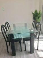 Glass top Dining Table (two tier) and 4 Chairs