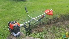 "Brand New" Brushcutter/Weedeater,.Still Boxed..43cc, 2 stroke air cooled, Brand is TMaker..